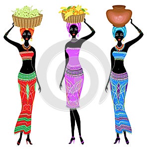 Collection. Beautiful Afro-american lady. The girl is carrying a basket on her head with persimmons, oranges, bananas, grapes and