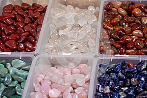 Collection of beautiful precious stones against white background. . Natural semi-precious ornamental stones