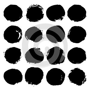 Collection of black grunge paint circles, stains. Brush strokes isolated on white background. Vector illustration.