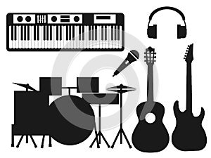 Collection of black silhouettes of musical instruments on a white background