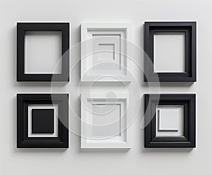 A collection of black and white picture frames arranged neatly against a white backdrop, showcasing a variety of sizes