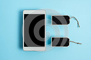 Collection of Real Blank Empty Sticker Card Tag With An Elastic Band On A Different Color Background Containing Modern Gadget