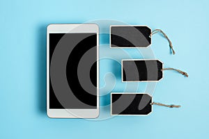 Collection of Real Blank Empty Sticker Card Tag With An Elastic Band On A Different Color Background Containing Modern Gadget