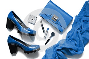 Collection of blue women`s accessories for special date or holiday. Flat lay. Trendy color of 2020 Year