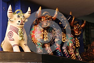 A collection of Pucara Bull statues photo