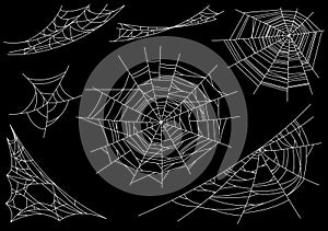 Collection of Cobweb, isolated on black, transparent background. Spiderweb for Halloween design. Spider web elements photo