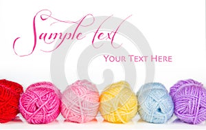 Collection of colorful balls of woolen yarn