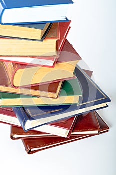 Collection of colorful books, stack of books stacked, isolated on white background