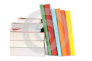 Book stack, leaning, several, isolated white background