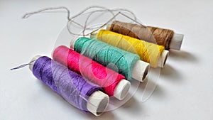 A collection of colorful threads photo