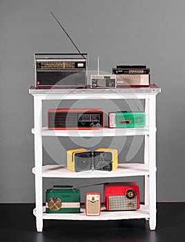 Collection of colorful vintage transistor radios