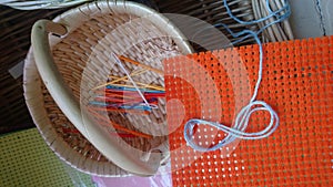 Collection of crochet needles in a wicker basket