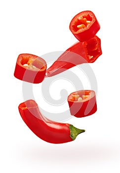 Collection of cut red chili pepper vegetables isolated on white