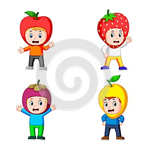 The collection of the cute boys using the fruits costume with different variant photo