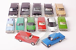 Collection of die-cast car models isolated on the white background