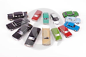 Collection of die-cast car models isolated on the white background