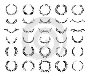 Collection of different black and white silhouette circular laurel foliate, wheat and oak wreaths depicting an award, achievement photo