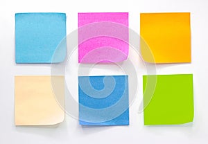 Collection of different colored sheets of note papers Isolated on white background,post it notes