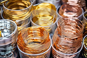 collection of different metal wires used for earring making