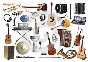 Collection of different musical instruments on white background