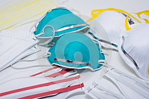 Collection of different types of N95 respirators mask photo