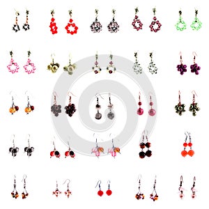 Collection of ear rings on white background