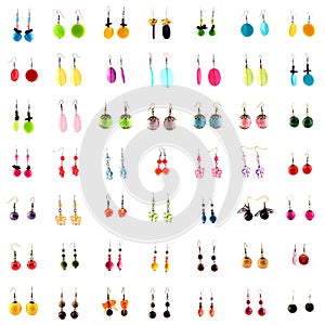 Collection of ear rings on white background