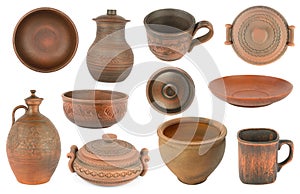 Collection of earthenware and ceramic dishes isolated on white