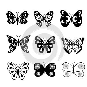 A collection of fancy butterflies in flat style. Vector set of black butterflies isolated on white background.