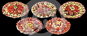Collection of Five Plateful Garnished Appetizer Savory Dishes Isolated on Black Background
