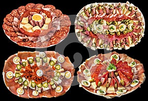 Collection of Four Garnished Appetizer Savory Dishes Isolated on Black Background