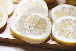 Collection of fresh grapefruit slices on background. Rotation citrus fruit. Top view.