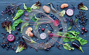 Collection of fresh purple fruit and vegetables