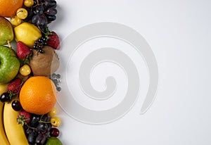 Collection fruits and vegetables on white background with copy space.