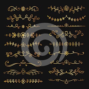 Collection of golden hand drawn flourish text dividers.