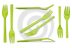 Collection green plastic forks isolated