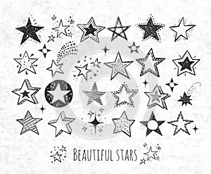 Collection of grunge doodle stars on rice paper background. Vector illustration.