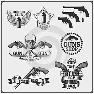 Collection of Gun club emblems, labels and design elements. Revolvers, bullets and target. photo