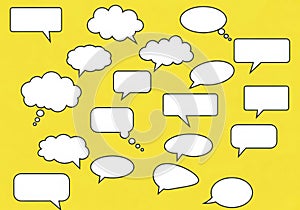 Collection of hand drawn speech bubbles and thought bubbles on yellow background