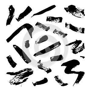 Collection of hand-drawn splashes. Vector set of brush strokes. Isolated on white background. Black and white.