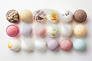 A collection of handmade, natural ingredient bath bombs displayed against a white background,top view