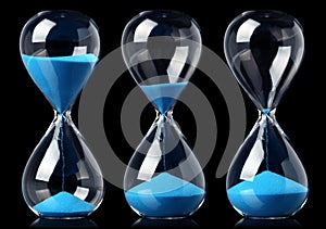 Collection of hourglasses with blue sand showing the passage of time