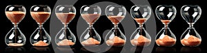 Collection of hourglasses with red sand showing the passage of time