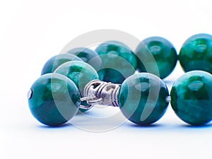 Collection jade of various tumbled green jade mineral stones nephrite and jadeite isolated on white background