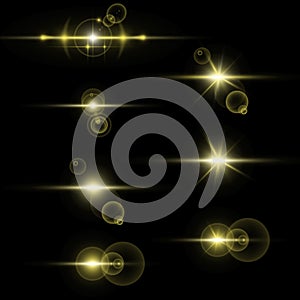 Collection of light effects on black background.