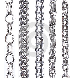 Collection of metal chain parts on white