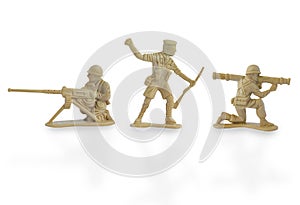 Collection of miniature toy soldiers with guns  on white background with clipping path.