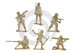 Collection of miniature toy soldiers with guns on white background.