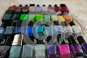 Collection of multi-colored bottles of nail polish