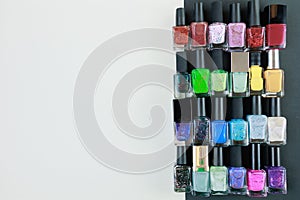 Collection of multi-colored bottles of nail polish